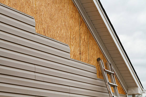 Professional Emergency Siding Repair technician working in Jefferson, OH